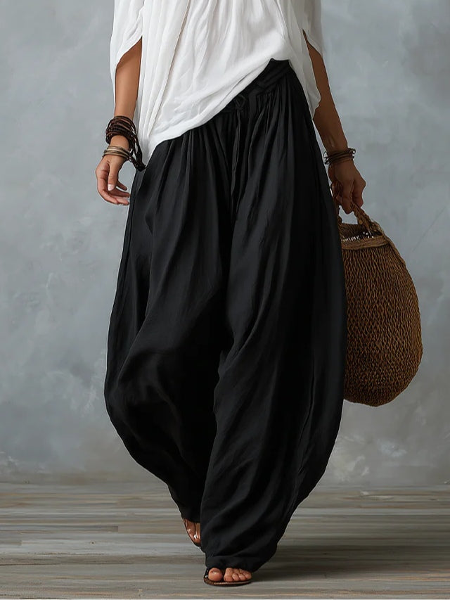 Conjunto Blanco de Top con Hombros Descubiertos y Pantalón Holgado